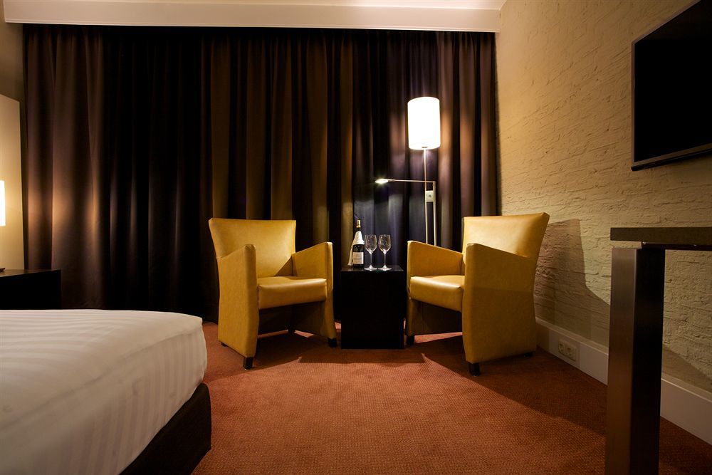 Hotel Arrows Uden Bagian luar foto